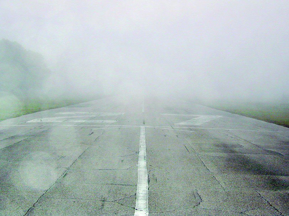 foggy plane runway